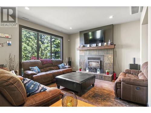 5581 Eagle Bay Road Unit# 8, Eagle Bay, BC - Indoor Photo Showing Living Room With Fireplace