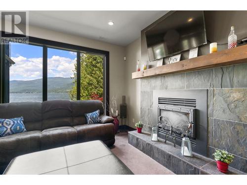 5581 Eagle Bay Road Unit# 8, Eagle Bay, BC - Indoor Photo Showing Living Room With Fireplace