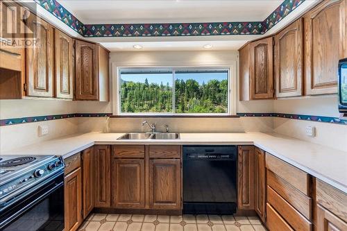 12 Hazlewood  Drive, Trail, BC - Indoor Photo Showing Kitchen With Double Sink