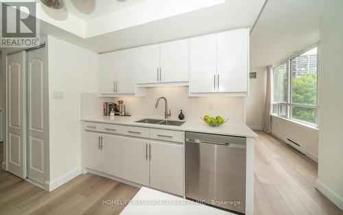 304 - 10 Torresdale Avenue W, Toronto C07, ON - Indoor Photo Showing Kitchen With Double Sink
