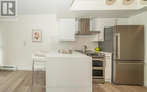 304 - 10 Torresdale Avenue W, Toronto C07, ON - Indoor Photo Showing Kitchen With Stainless Steel Kitchen