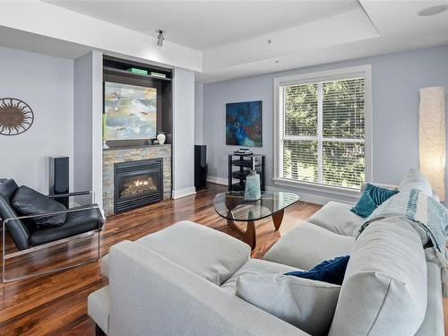 701-1400 Lynburne Pl, Langford, BC - Indoor Photo Showing Living Room With Fireplace