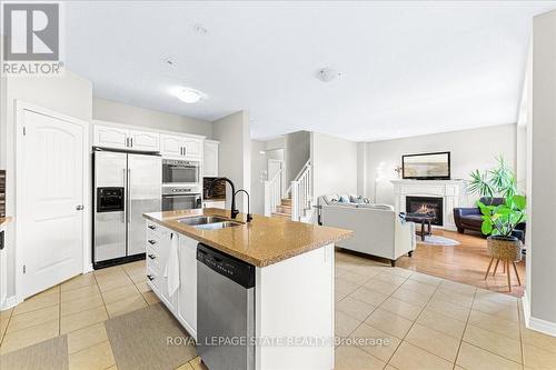 9 Tolton Drive, Guelph (Pine Ridge), ON - Indoor Photo Showing Kitchen With Fireplace With Double Sink