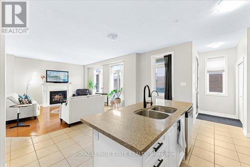 9 Tolton Drive, Guelph, ON - Indoor Photo Showing Kitchen With Fireplace With Double Sink