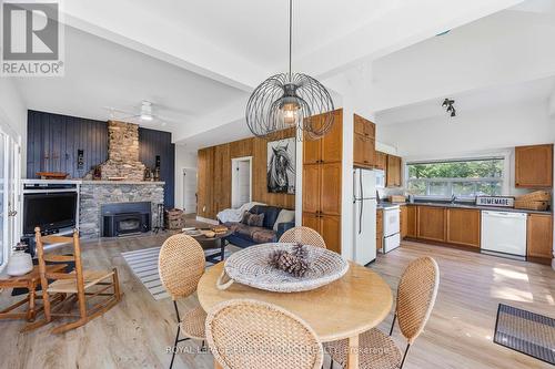 20 Tiny Beaches Road N, Tiny, ON - Indoor Photo Showing Dining Room With Fireplace