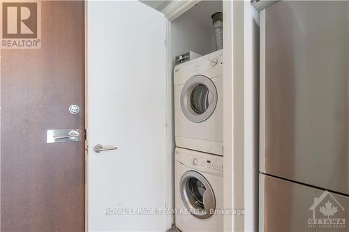 1606 - 199 Slater Street, Ottawa, ON - Indoor Photo Showing Laundry Room