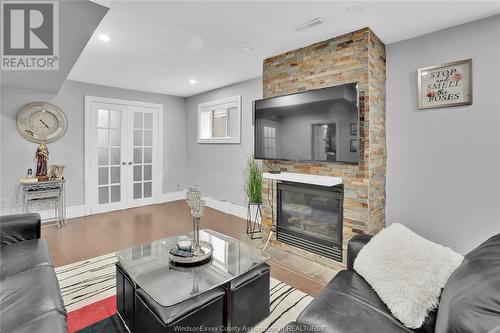 2445 Trappers Avenue, Windsor, ON - Indoor Photo Showing Living Room With Fireplace