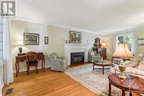 1911 Illinois Avenue, Ottawa, ON - Indoor Photo Showing Living Room With Fireplace