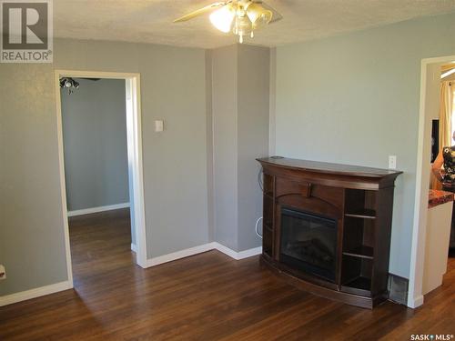 302 Carbon Avenue, Bienfait, SK - Indoor Photo Showing Other Room With Fireplace