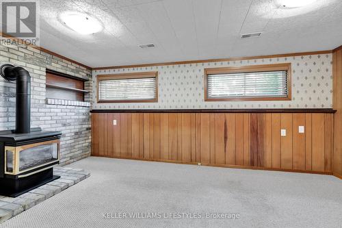 Family room with gas fireplace - 39 Oneida Road, London, ON - Indoor Photo Showing Other Room With Fireplace