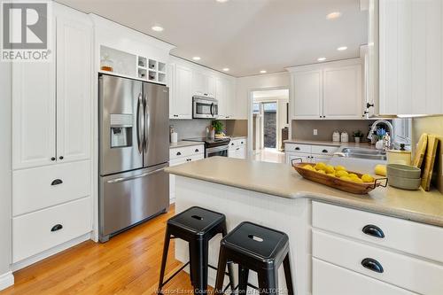 21430 Lynn Drive, Wheatley, ON - Indoor Photo Showing Kitchen With Double Sink