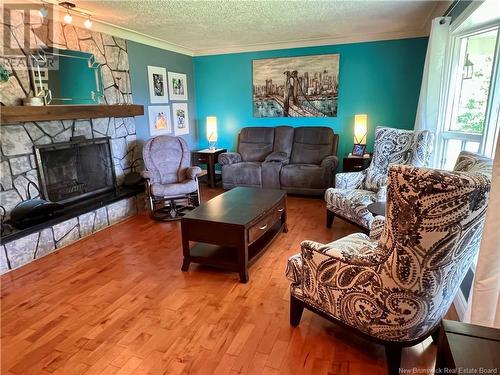 19 Riverview Street, Perth-Andover, NB - Indoor Photo Showing Living Room With Fireplace