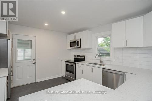 23 Hazel Street, St. Catharines, ON - Indoor Photo Showing Kitchen With Double Sink