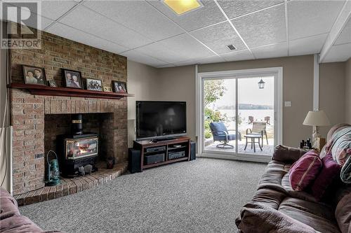 18428 County Road 2 Road, Cornwall, ON - Indoor Photo Showing Living Room With Fireplace