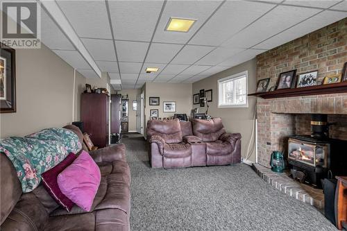 18428 County Road 2 Road, Cornwall, ON - Indoor Photo Showing Living Room With Fireplace