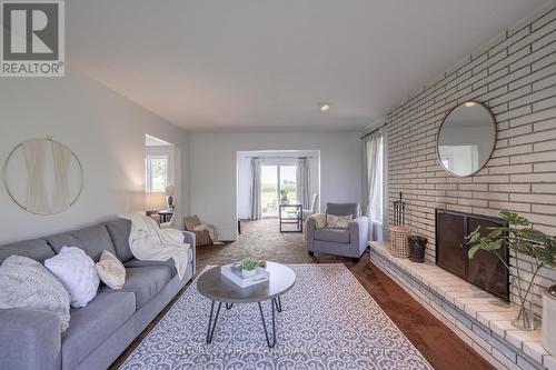 14004 Cleeves Line, Chatham-Kent (Highgate), ON - Indoor Photo Showing Living Room With Fireplace