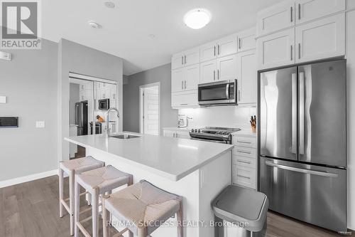 312 - 50 Kaitting Trail, Oakville, ON - Indoor Photo Showing Kitchen With Stainless Steel Kitchen