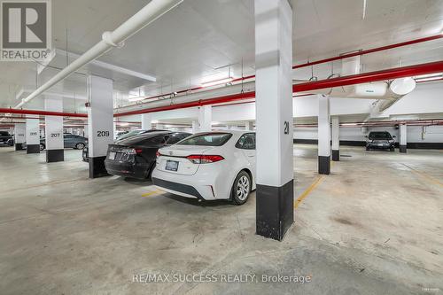 312 - 50 Kaitting Trail, Oakville, ON - Indoor Photo Showing Garage