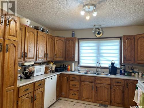 141 2Nd Street W, Pierceland, SK - Indoor Photo Showing Kitchen With Double Sink