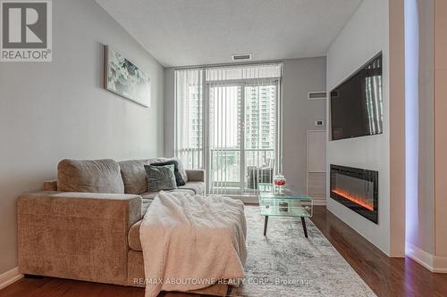 315 - 205 Sherway Gardens Road W, Toronto, ON - Indoor Photo Showing Living Room With Fireplace