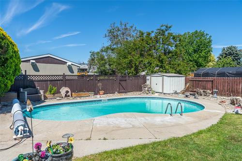 1280 Collison Road, Kelowna, BC - Outdoor With In Ground Pool With Backyard