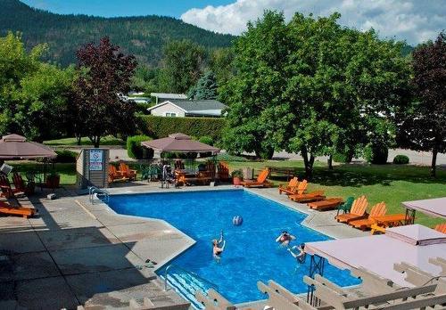 3205-415 Commonwealth Road, Kelowna, BC - Outdoor With In Ground Pool With Backyard