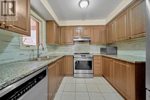 104 Odoardo Di Santo Circle, Toronto W05, ON - Indoor Photo Showing Kitchen With Double Sink