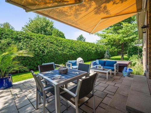 Backyard - 4 Place Anne-Hébert, Notre-Dame-De-L'Île-Perrot, QC - Outdoor With Deck Patio Veranda With Exterior