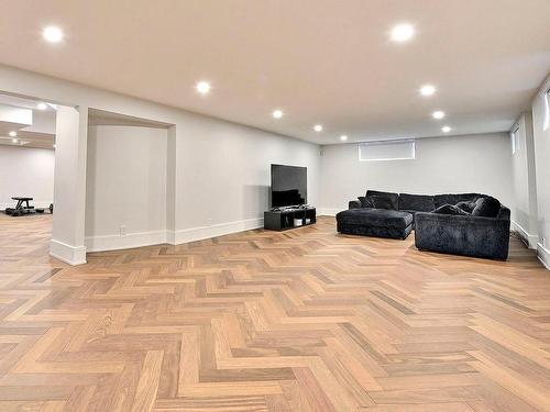 Family room - 239 Rue Lacoste, Laval (Sainte-Dorothée), QC - Indoor Photo Showing Basement