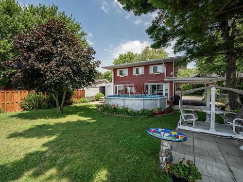 Cour - 107 Av. De Venise E., Venise-En-Québec, QC - Outdoor With Above Ground Pool