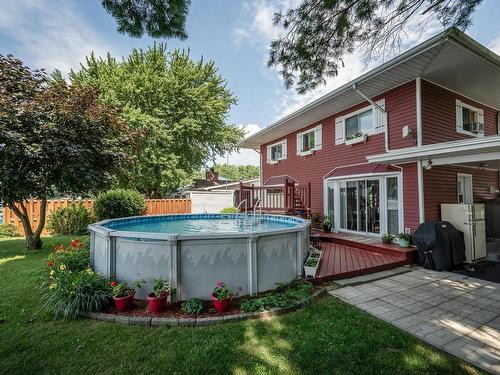 Cour - 107 Av. De Venise E., Venise-En-Québec, QC - Outdoor With Above Ground Pool