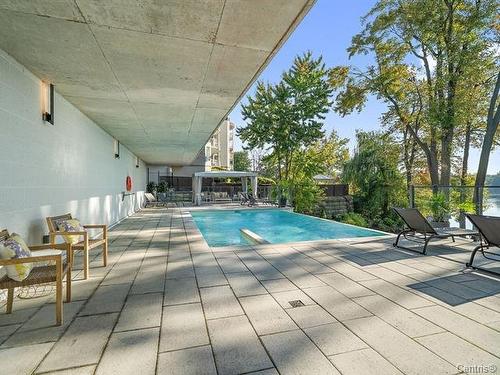 Piscine - 604-510 Boul. Des Prairies, Laval (Laval-Des-Rapides), QC - Outdoor With In Ground Pool