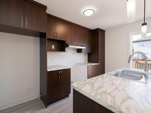 Cuisine - Rue Elsie, Salaberry-De-Valleyfield, QC - Indoor Photo Showing Kitchen With Double Sink