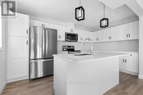 17 - 261 Pittock Park Road, Woodstock, ON - Indoor Photo Showing Kitchen With Double Sink