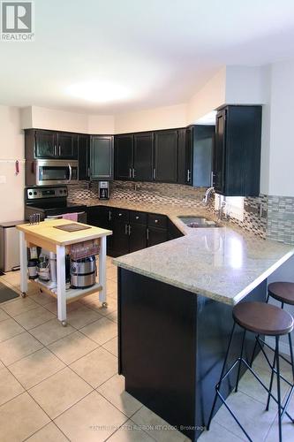 24642 Dodge Drive, Adelaide Metcalfe, ON - Indoor Photo Showing Kitchen