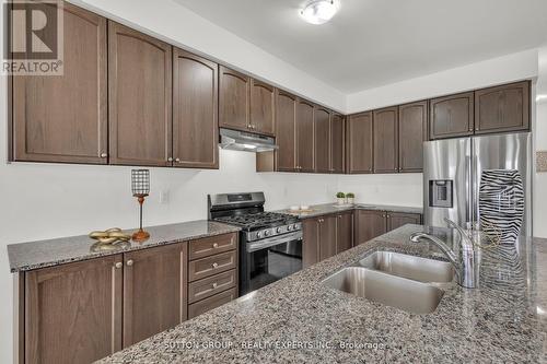 27 Brixham Lane, Brampton, ON - Indoor Photo Showing Kitchen With Double Sink With Upgraded Kitchen