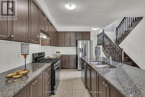 27 Brixham Lane, Brampton, ON - Indoor Photo Showing Kitchen With Double Sink With Upgraded Kitchen