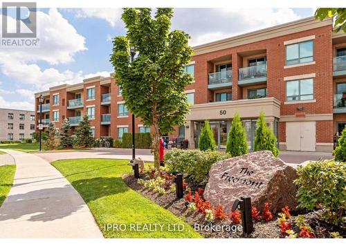 218 - 50 Via Rosedale Way, Brampton, ON - Outdoor With Facade