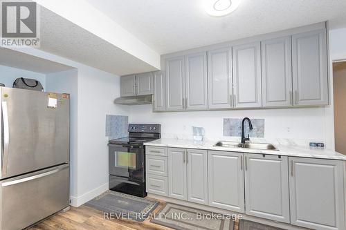 200 Snyders Avenue, Central Elgin, ON - Indoor Photo Showing Kitchen With Double Sink