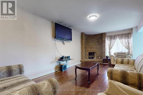 9 Horseshoe Crescent, Toronto E11, ON - Indoor Photo Showing Living Room With Fireplace