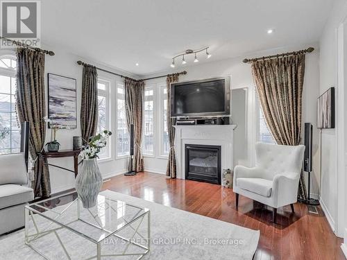 Upper - 80 Geddington Crescent, Markham (Box Grove), ON - Indoor Photo Showing Living Room With Fireplace