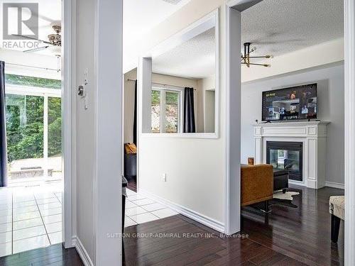 66 Christy Drive, Wasaga Beach, ON - Indoor Photo Showing Other Room With Fireplace