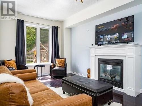 66 Christy Drive, Wasaga Beach, ON - Indoor Photo Showing Living Room With Fireplace