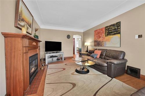 40 Barons Avenue S, Hamilton, ON - Indoor Photo Showing Living Room With Fireplace