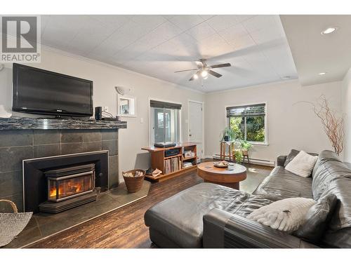3081 Smith Creek Road, West Kelowna, BC - Indoor Photo Showing Living Room With Fireplace