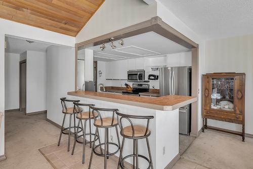 209-4340B Beach Avenue, Peachland, BC - Indoor Photo Showing Kitchen With Stainless Steel Kitchen