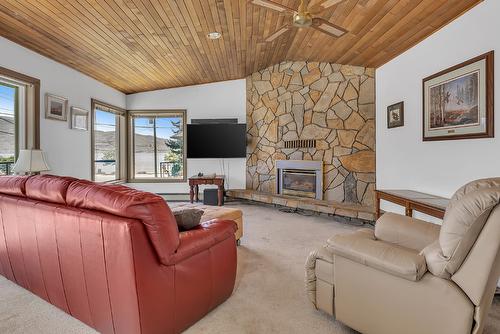 209-4340B Beach Avenue, Peachland, BC - Indoor Photo Showing Living Room With Fireplace