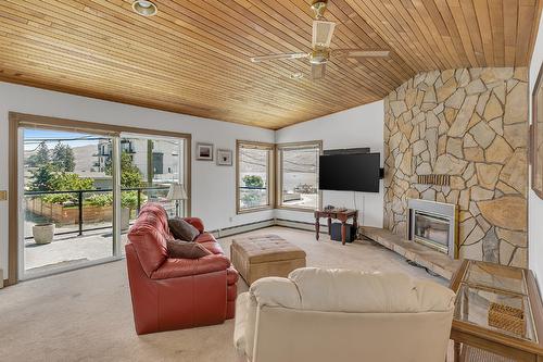 209-4340B Beach Avenue, Peachland, BC - Indoor Photo Showing Living Room With Fireplace