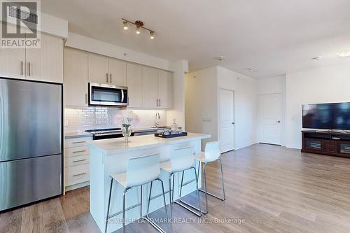 614 - 85 Oneida Crescent, Richmond Hill (Langstaff), ON - Indoor Photo Showing Kitchen With Upgraded Kitchen