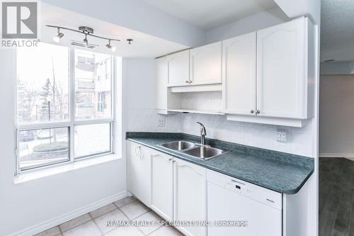 209 - 4640 Kimbermount Avenue, Mississauga, ON - Indoor Photo Showing Kitchen With Double Sink